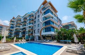 Alanya Kestel Plaja 20 m  Bahçeli Satılık 1+1 Eşyalı Daire